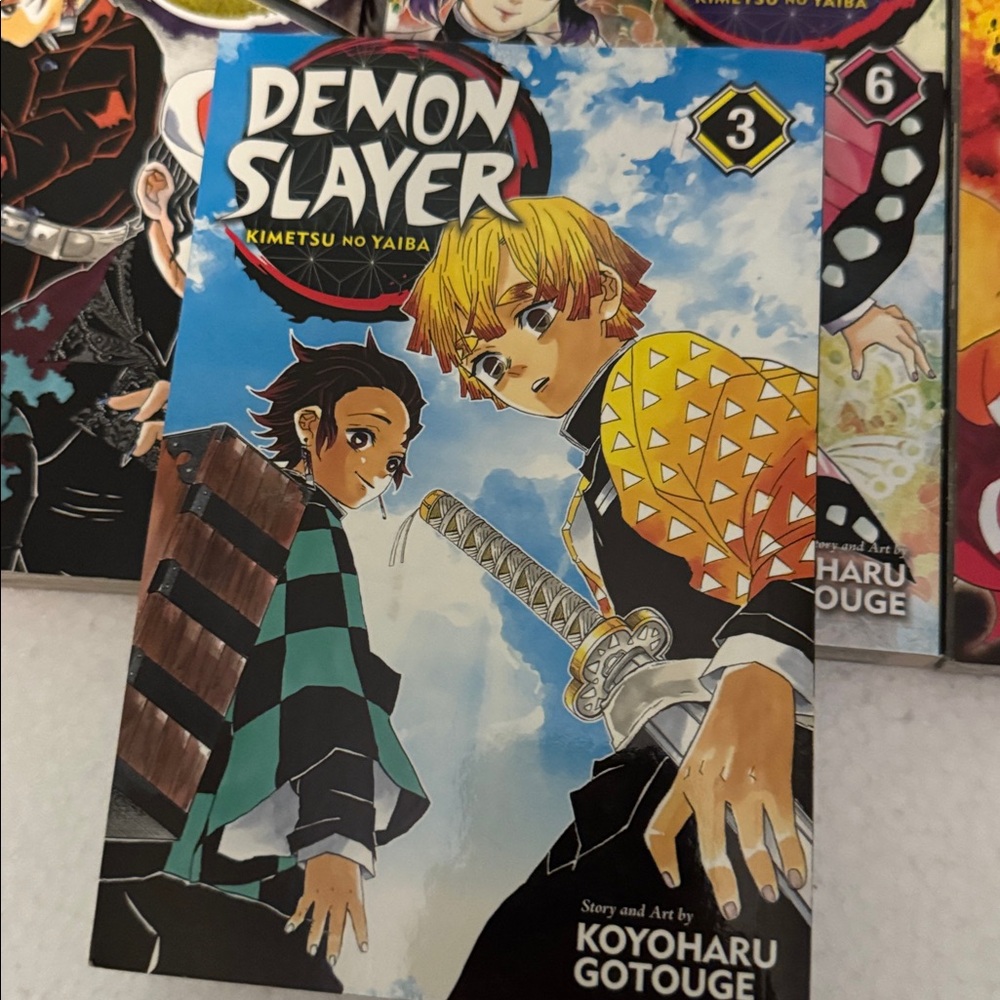 Manga Demon Slayer Volumes — Blue, Yellow, Black, Pink, Orange - Picture 5 of 5